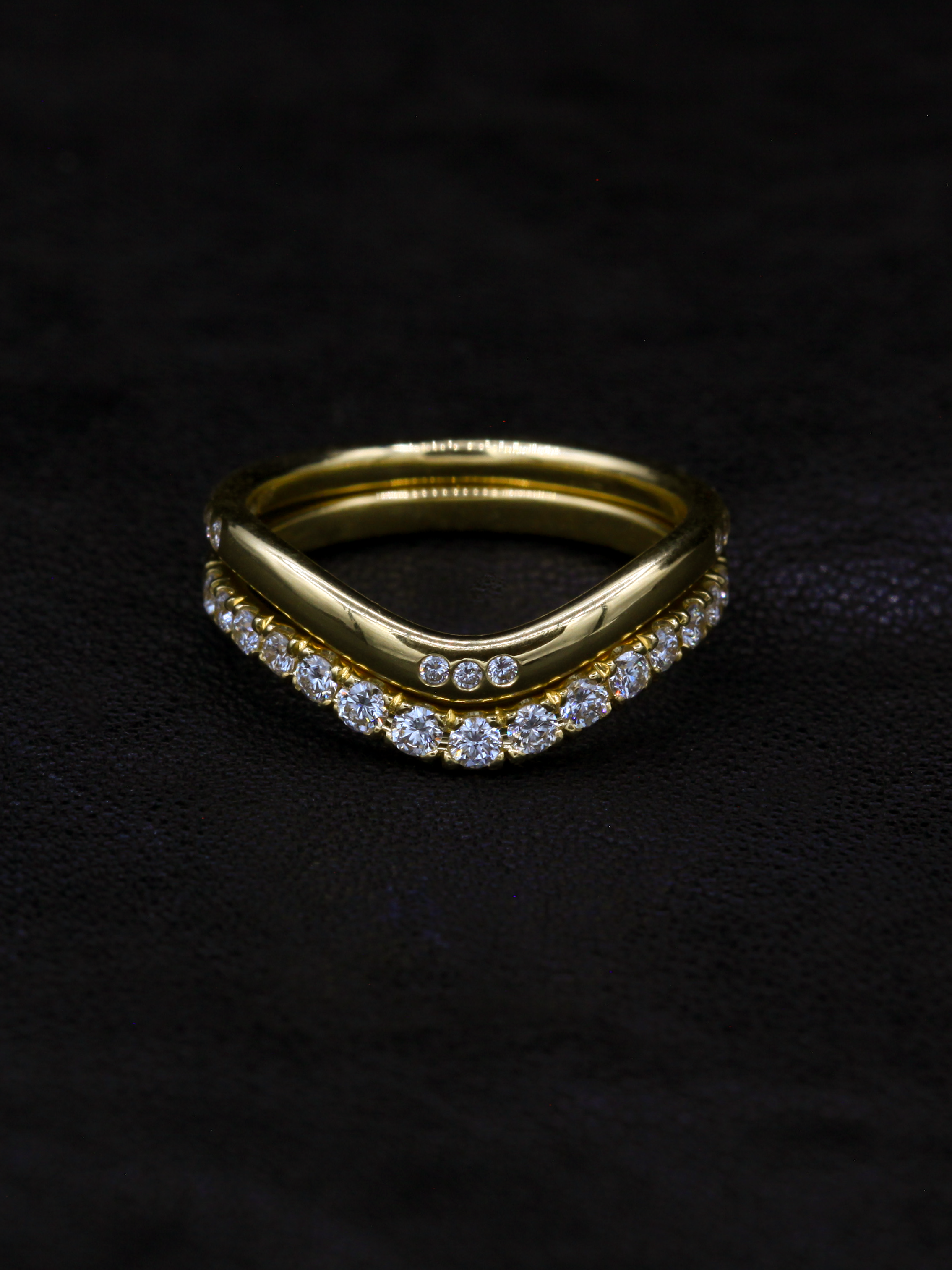 Signature Pave Wedding Band in 18k yellow gold set with E-F VS clarity laboratory-grown diamonds stacked under the Signature Wedding Band.